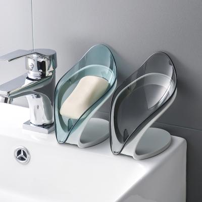 China 2021 Modern Leaf Shape Rotating Suction Cup Soap Drain Multifunctional No-Puncture Shelf Soap Box Drain Soap Holder Box for sale