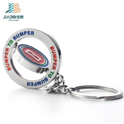 China Jibao Metal Opens Cheap Custom Metal Die Casting Enamel Silver Rotating Coin Spinning Key Chain for sale