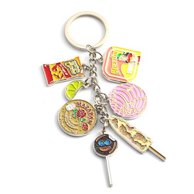 China Zinc alloy custom design logo soft enamel keychains custom instruments for sale