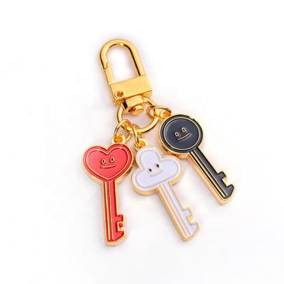 China Portable Colorful Charm Cartoon Smile Key Chain Key Chain For Ladies for sale