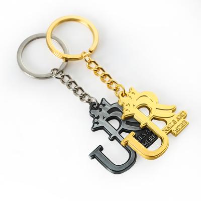 China Latest Design Bag Letter Key Chain Wholesale Metal Zinc R Alphabet Key Chain for sale