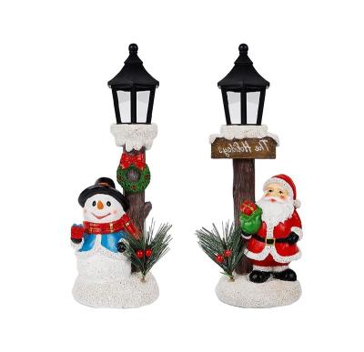 China Worlwide FREE SAMPLE Christmas Tabletop Ornament Resin Snowman Santa Ornament Lit Street Lamp, Christmas Fireplace Ornament for sale