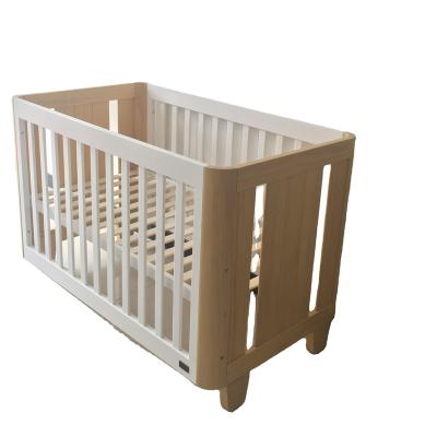 China 3 Position Height Adjustment Exquisite Craftsmanship High Quality Wood Crib Hutch Head Support Most Beautiful Baby Rocker Bed for sale