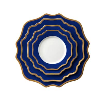 China Sustainable Hot Sale Hotel Dinnerware Set Scalloped Blue And White Porcelain Dish With Gold Rim for sale