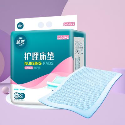 China 4 Adhesive Strips Disposable Waterproof Bed Pads Underpads 30x36 for sale