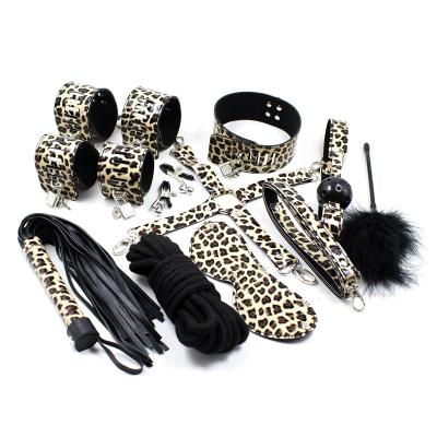 China Women's Leather Bondage 10 PCs/Set Leopard Print Leather Bondage Kit, SM Slave Passion Bondage Restraints BDSM Handcuffs Gag Whip Collar Sex Game Bondage for sale