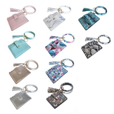 China Women Key Chain PU Pocket Mobile Phone Purse Tassel Wristlet Keychain ID Card Wallet Waterproof Leather Wristband for sale