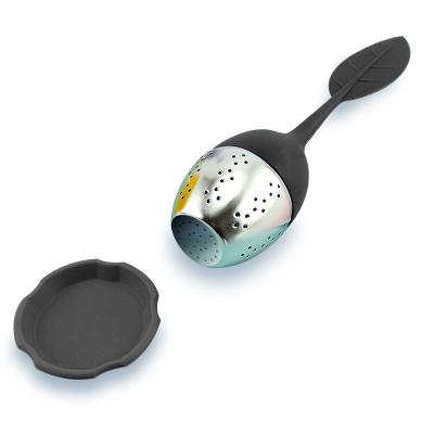 China Sustainable Well Stocked Black Leaf Shaped Silicone Handle Stainless Steel Tea Infuser Strainer With Tray for sale