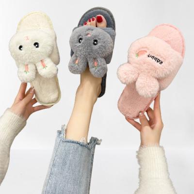 China Damping 2021 New Cartoon Rabbit Winter Flat Fur Comfortable Furry Home Slippers Women Slippers for sale