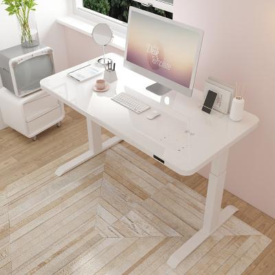 China Modern office lifting desk motorized rising glass or wood design sit to stand electric standing desk for sale