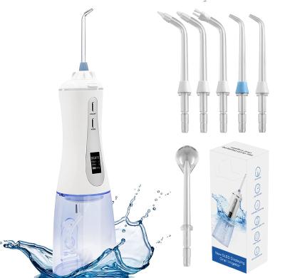 China Portable Electric Dental Cordless Oral Nozzle 360 ​​Rated Water Flosser For Teeth Cleaning for sale