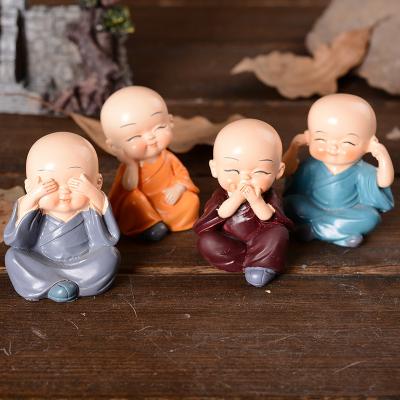 China Craftsman Little Monk Shaolin Peg Biter Car Craft Decoration Couple Gift Car Ornament for sale