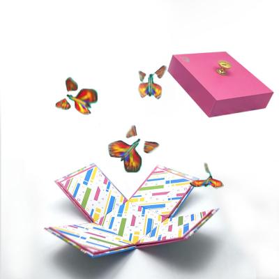 China Free Materials Design Reused Logo Gift Packaging Explosion Box Surprise Gift Box Mystery Custom Box With Flying Butterfly for sale