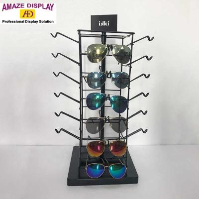 China Custom Design Rotatable Shape Metal Shaft Rotating Table Top 24 Pairs Sunglasses Display Stands en venta