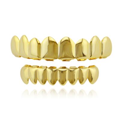 China Punk Punk Hip Hops Gold Teeth Upper Lower Grills Dental Mouth Teeth Grillzs For Women Men Body Jewelry for sale