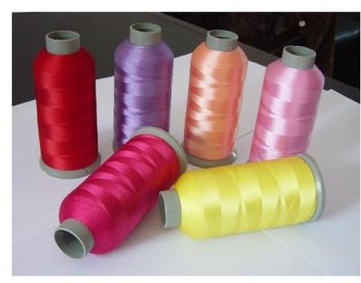 China Hundreds % Polyester Embroidery Threads 100g High Temperature Resistant Colors Available for sale