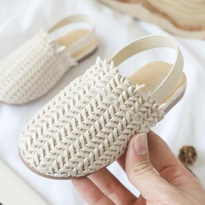 China New Style Korean Round Head Round Head Woven Slippers Girl's Wild Soft Bottom Sandals Children's Wild Shoes for sale