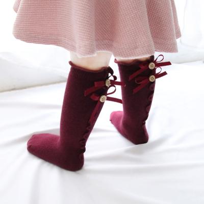 China New Girls Antibacterial Cute Kids Bows Christmas Baby Plain Ruffle Tube Socks for sale