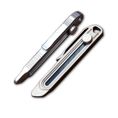 China Thumb Button Mini Utility Cutting Knife With Titanium Carbon Steel Blade Alloy Handle Paper Cutter Pocket Clip for sale