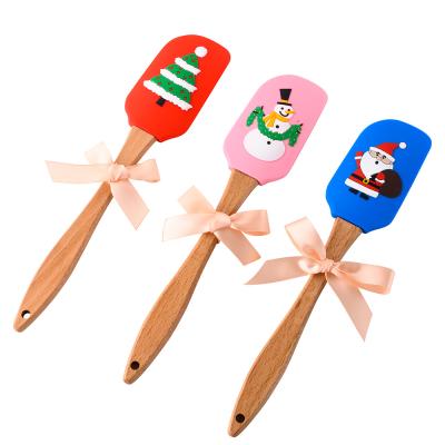 China Viable Spatula Cream Butter Silicone Mixing Scraper with Wooden Handle for Christmas Decoration Baking for sale