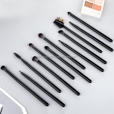 China Angular Blush Private Label Black Professional Eye Makeup Brushes Eyeshadow Highlighter Eyebrow Blending Eyeshadow Brush for sale