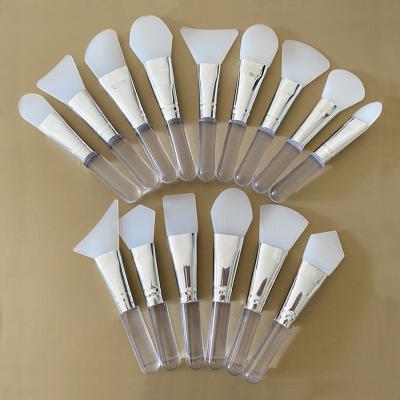 China Angular Blush Different Shaped Handle Mini Facial Makeup Brush Mask Simple Short Silicone Brush Spatula for sale