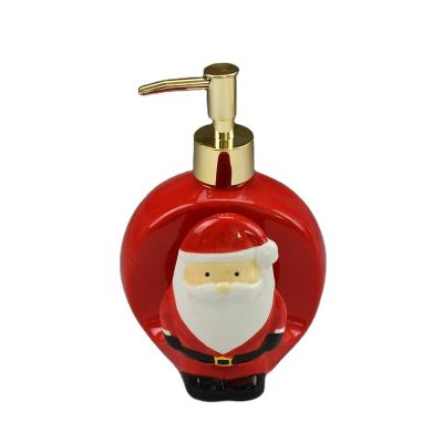 China Wholesale Modern Design Hand Ceramic Santa Claus Liquid Soap Dispenser With Sponge Holder For Christmas for sale