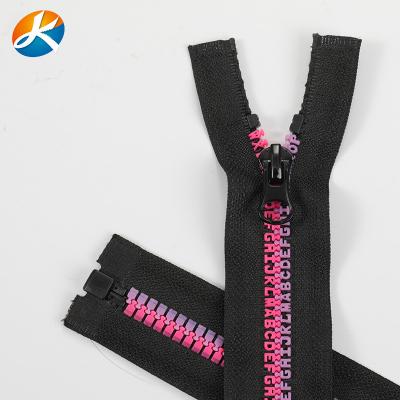 China Other Wholesale Open End Stain Apparel Home Textile Open End Plastic Ribbon Glue Teeth Zipper Resin Zipper No. 5 for sale