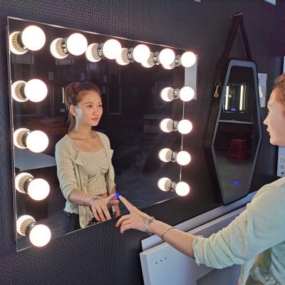 China Hollywood Illuminated Led Wall Mounted Makeup Vanity Mirror Light Bulbs Bedroom Lighted Cosmetic Mirror With Bulbs for sale