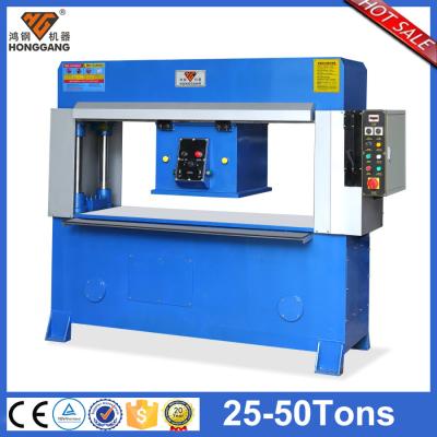 China hydraulic laser cutting china travel head clothes fabric cutting machine for sale