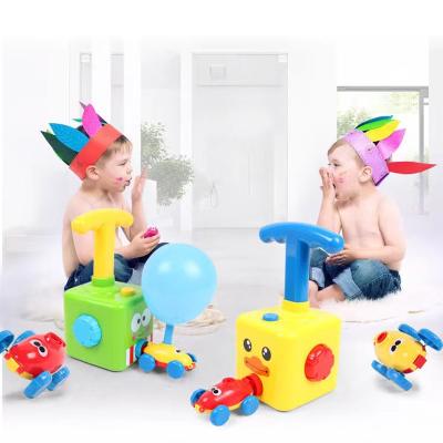 China Playing Hand Squeezed Balloon Launcher Car Pneumatic Air Compressed Power Toy Cars For Kid Birthday Gift for sale