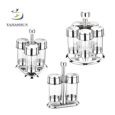 China Stainless Steel Rotating Base Set Shaker Container Seasoning Bottle Multifunctional Glass Seasoning Bottle Stainless Steel Condiment Set for sale