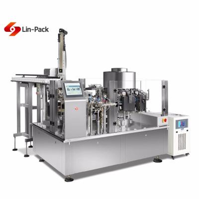 China Automatic Rotary Beverage Chicken Feet Vacuum Filling Packing Machine for sale