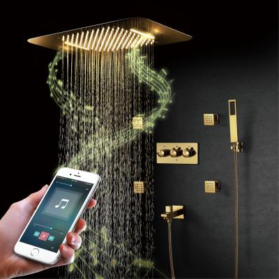 China Slide Bar Gold 23*15 Inch Ceiling Led Shower Head With Music System Ceiling Bathroom Rain And Waterfall Shower Faucet Set for sale