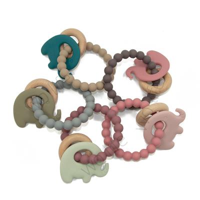 China Toy Wholesale Silicone Wooden Ring Soft Elephant Teether Sensory Chew Toys Bpa Free Chew Animal Baby Customized Teether Toy for sale