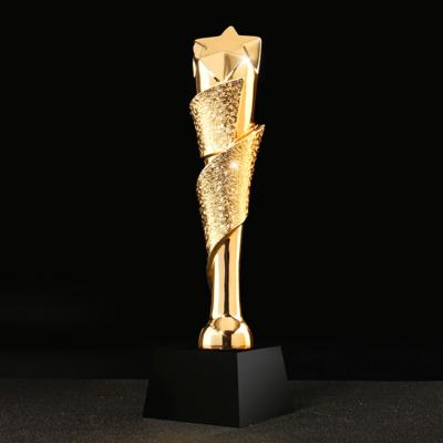 China Gold Rising Star Crystal Trophy Resin Award en venta