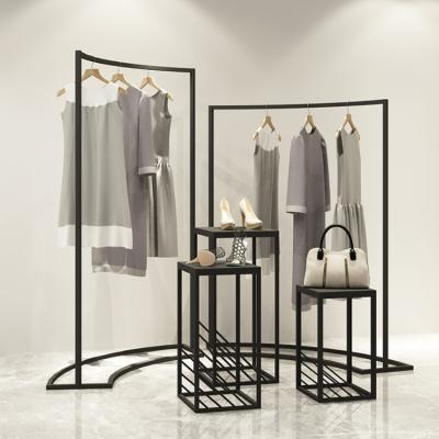 China Good Quality Retail Stores Factory Black Clothing Display Rack Nesting Table Furniture For Men Garment Retail Store for sale