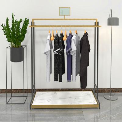 China Eco-friendly material wholesale custom clothing display stand fabric rack retail garment store showroom furniture for sale