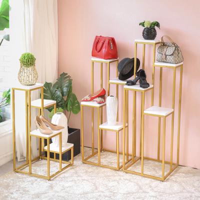 China Beautiful Gold Clothing Store Bag Display Rack Shoes Store Showroom Decoration Display Nesting Table for sale