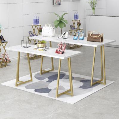 China Beautiful Unique Design Gold Interlocking End Table High And Low Display Table Set For Retail Clothes Shoes Bag Store for sale