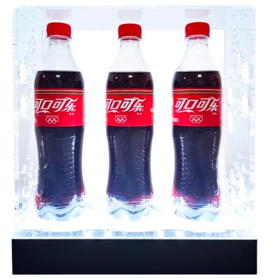 China Hotel Coke 360 ​​Rotating Retail Display Table Mobile Rack for sale