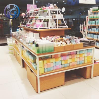 China Custom shop jewelry metal miniso shelf cosmetics miniso display stand boutique miniso display rack for sale