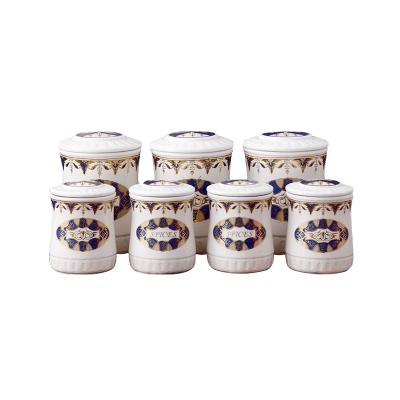 China Sustainable 7 Food Ceramic Canister Set With High Quality Metal Rack Storage Bottles for sale