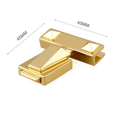 China Eco-friendly Customized Bag Accessories Lock Light Gold Bag Push Lock Bags Hardware Lock For Women Handbags for sale