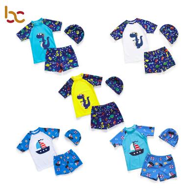 China Plus Size Three Piece Dinosaur Swimwear Sets Rashguard Boy Training Short Sleeve Child Swimwear Kids Designer Custom Kids Swimsuit for sale