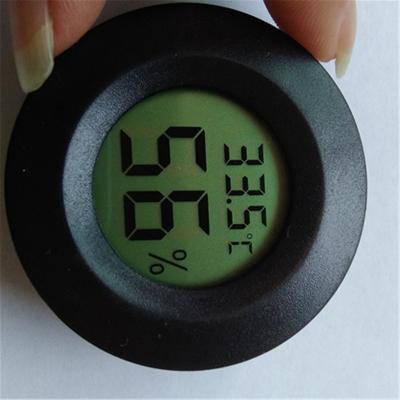 China Round Wireless Digital Thermometer TPM-50 46*46*15mm Temperature Humidity Meter for sale