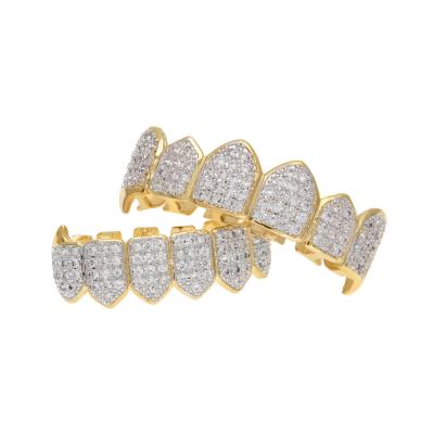 China Hip Hop Brass Iced Out Teeth Grillz 18K Gold Platinum Plated Grillz Fangs Hitter Body Jewelry Gift Braces GRCZ006 for sale