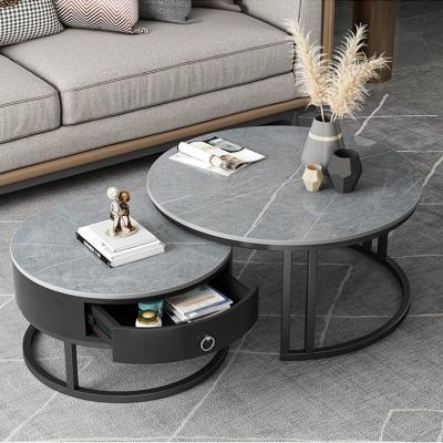 China Modern Round Nesting Extendable Coffee Table Curved Black Gold Metal Living Room Coffee Table for sale