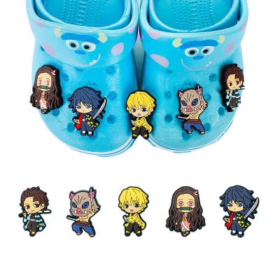 China Choke Charm New Arrival Anime Demon Slayer Shoe Charms Fang Blade Shoe Decoration For Kids Soft PVC Choke Button for sale