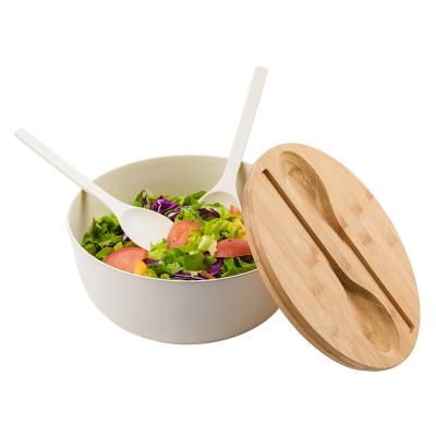 China Multi sustainable colored bamboo fiber salad bowl with built in utensils as hands and salad lid for sale